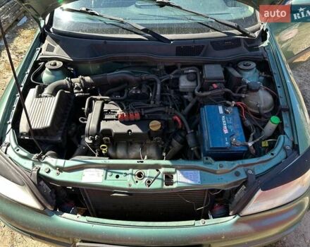 Зеленый Опель Астра, объемом двигателя 1.4 л и пробегом 300 тыс. км за 2300 $, фото 1 на Automoto.ua