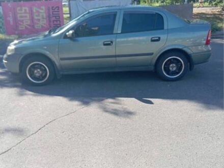 Зеленый Опель Астра, объемом двигателя 1.4 л и пробегом 290 тыс. км за 2500 $, фото 1 на Automoto.ua