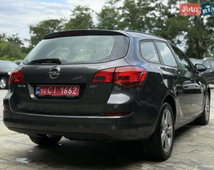 Оранжевый Опель Астра, объемом двигателя 1.7 л и пробегом 171 тыс. км за 7700 $, фото 2 на Automoto.ua