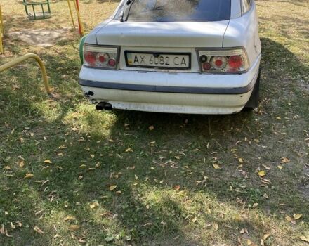 Белый Опель Калибра, объемом двигателя 2 л и пробегом 250 тыс. км за 1500 $, фото 1 на Automoto.ua