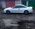Білий Опель Калібра, об'ємом двигуна 2 л та пробігом 300 тис. км за 1400 $, фото 2 на Automoto.ua