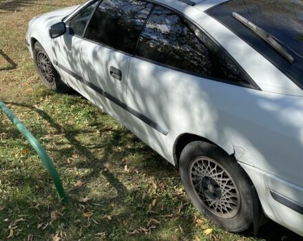 Белый Опель Калибра, объемом двигателя 2 л и пробегом 250 тыс. км за 1500 $, фото 5 на Automoto.ua