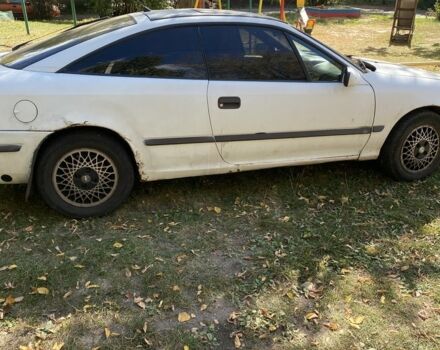 Белый Опель Калибра, объемом двигателя 2 л и пробегом 250 тыс. км за 1500 $, фото 6 на Automoto.ua