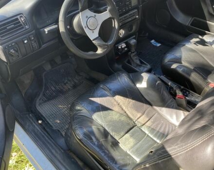 Белый Опель Калибра, объемом двигателя 2 л и пробегом 250 тыс. км за 1500 $, фото 4 на Automoto.ua