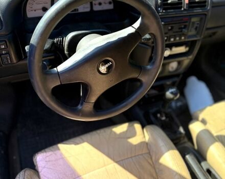 Білий Опель Калібра, об'ємом двигуна 2 л та пробігом 470 тис. км за 2700 $, фото 3 на Automoto.ua