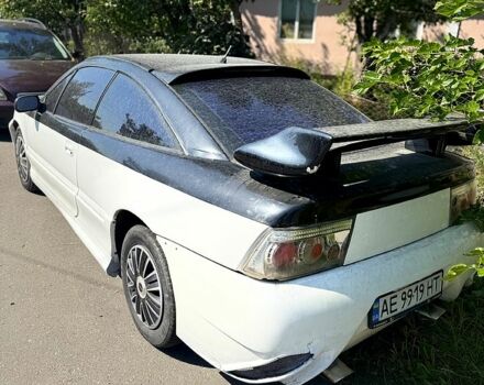 Білий Опель Калібра, об'ємом двигуна 2 л та пробігом 470 тис. км за 2700 $, фото 1 на Automoto.ua