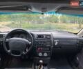Белый Опель Калибра, объемом двигателя 2 л и пробегом 300 тыс. км за 1000 $, фото 7 на Automoto.ua