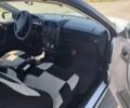 Білий Опель Калібра, об'ємом двигуна 2 л та пробігом 300 тис. км за 1681 $, фото 5 на Automoto.ua