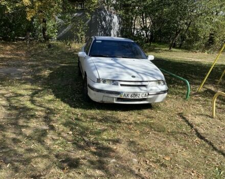 Белый Опель Калибра, объемом двигателя 2 л и пробегом 250 тыс. км за 1500 $, фото 1 на Automoto.ua