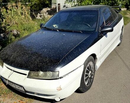 Білий Опель Калібра, об'ємом двигуна 2 л та пробігом 470 тис. км за 2700 $, фото 1 на Automoto.ua