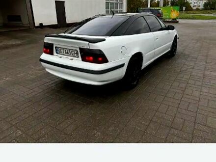 Білий Опель Калібра, об'ємом двигуна 2 л та пробігом 250 тис. км за 1900 $, фото 1 на Automoto.ua