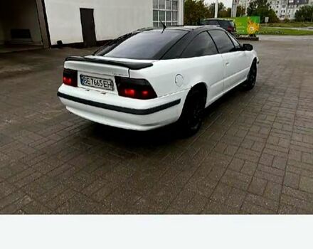 Белый Опель Калибра, объемом двигателя 2 л и пробегом 250 тыс. км за 1900 $, фото 1 на Automoto.ua