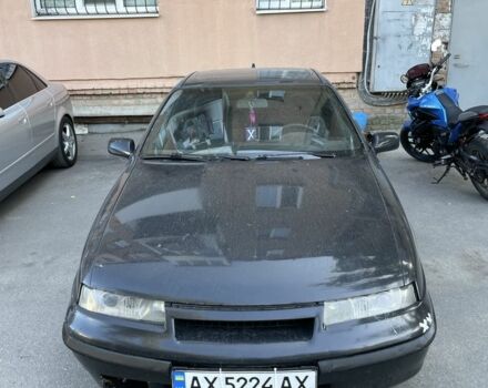 Черный Опель Калибра, объемом двигателя 2 л и пробегом 300 тыс. км за 1250 $, фото 8 на Automoto.ua