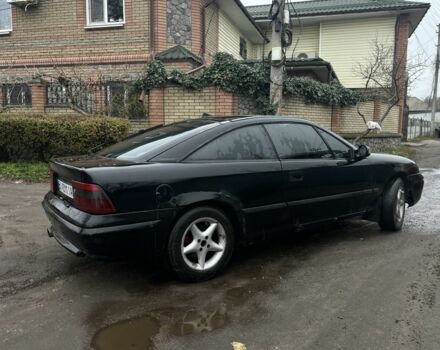 Черный Опель Калибра, объемом двигателя 2 л и пробегом 275 тыс. км за 2800 $, фото 3 на Automoto.ua