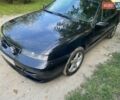 Черный Опель Калибра, объемом двигателя 2 л и пробегом 245 тыс. км за 2900 $, фото 6 на Automoto.ua