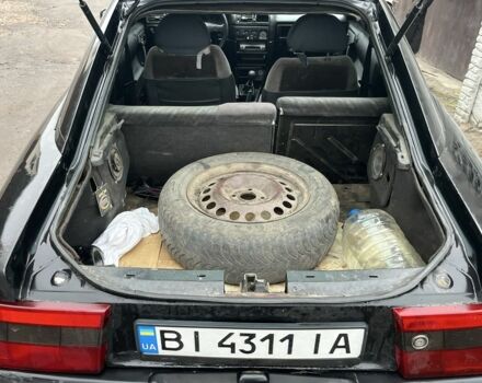 Черный Опель Калибра, объемом двигателя 2 л и пробегом 275 тыс. км за 2800 $, фото 7 на Automoto.ua