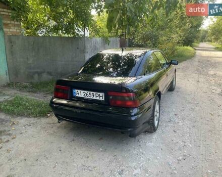 Черный Опель Калибра, объемом двигателя 2 л и пробегом 245 тыс. км за 2900 $, фото 3 на Automoto.ua