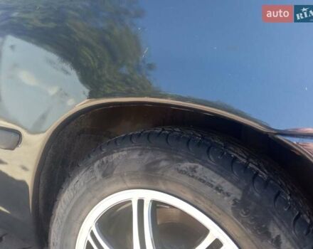 Черный Опель Калибра, объемом двигателя 2 л и пробегом 256 тыс. км за 3000 $, фото 2 на Automoto.ua