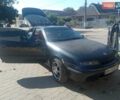 Черный Опель Калибра, объемом двигателя 2 л и пробегом 256 тыс. км за 3000 $, фото 1 на Automoto.ua