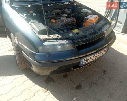 Черный Опель Калибра, объемом двигателя 2 л и пробегом 256 тыс. км за 3000 $, фото 14 на Automoto.ua