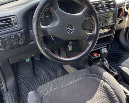 Черный Опель Калибра, объемом двигателя 2 л и пробегом 525 тыс. км за 2500 $, фото 3 на Automoto.ua