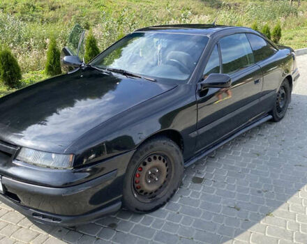 Черный Опель Калибра, объемом двигателя 2 л и пробегом 525 тыс. км за 2500 $, фото 1 на Automoto.ua