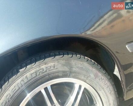 Черный Опель Калибра, объемом двигателя 2 л и пробегом 256 тыс. км за 3000 $, фото 12 на Automoto.ua