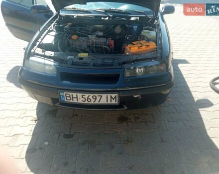 Черный Опель Калибра, объемом двигателя 2 л и пробегом 256 тыс. км за 3000 $, фото 3 на Automoto.ua