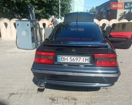 Черный Опель Калибра, объемом двигателя 2 л и пробегом 256 тыс. км за 3000 $, фото 5 на Automoto.ua