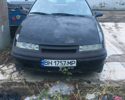 Черный Опель Калибра, объемом двигателя 2 л и пробегом 300 тыс. км за 1700 $, фото 3 на Automoto.ua