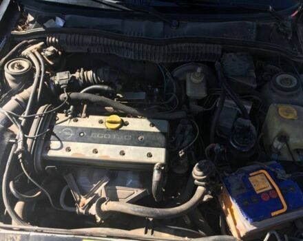 Черный Опель Калибра, объемом двигателя 2 л и пробегом 300 тыс. км за 1700 $, фото 5 на Automoto.ua