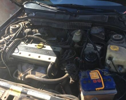 Черный Опель Калибра, объемом двигателя 2 л и пробегом 300 тыс. км за 1700 $, фото 4 на Automoto.ua