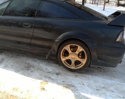 Чорний Опель Калібра, об'ємом двигуна 2 л та пробігом 520 тис. км за 2047 $, фото 2 на Automoto.ua