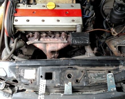 Чорний Опель Калібра, об'ємом двигуна 2 л та пробігом 520 тис. км за 2047 $, фото 6 на Automoto.ua