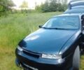 Чорний Опель Калібра, об'ємом двигуна 2 л та пробігом 520 тис. км за 2047 $, фото 1 на Automoto.ua