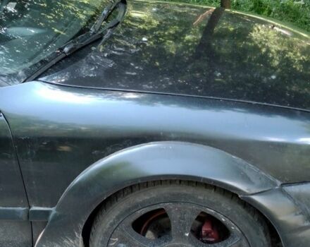 Чорний Опель Калібра, об'ємом двигуна 2 л та пробігом 520 тис. км за 2047 $, фото 12 на Automoto.ua