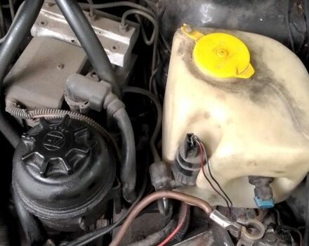 Чорний Опель Калібра, об'ємом двигуна 2 л та пробігом 520 тис. км за 2047 $, фото 5 на Automoto.ua