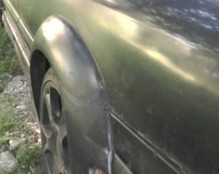 Чорний Опель Калібра, об'ємом двигуна 2 л та пробігом 520 тис. км за 2047 $, фото 9 на Automoto.ua