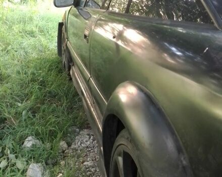 Чорний Опель Калібра, об'ємом двигуна 2 л та пробігом 520 тис. км за 2047 $, фото 10 на Automoto.ua