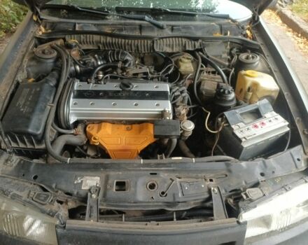 Чорний Опель Калібра, об'ємом двигуна 2 л та пробігом 330 тис. км за 3000 $, фото 5 на Automoto.ua