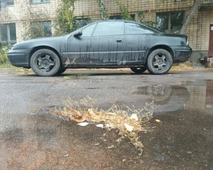 Чорний Опель Калібра, об'ємом двигуна 2 л та пробігом 330 тис. км за 3000 $, фото 1 на Automoto.ua