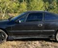 Черный Опель Калибра, объемом двигателя 2 л и пробегом 400 тыс. км за 1649 $, фото 1 на Automoto.ua
