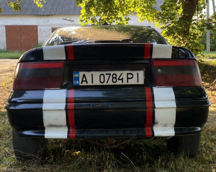 Черный Опель Калибра, объемом двигателя 2 л и пробегом 110 тыс. км за 1600 $, фото 1 на Automoto.ua