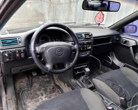 Черный Опель Калибра, объемом двигателя 2 л и пробегом 500 тыс. км за 1800 $, фото 1 на Automoto.ua