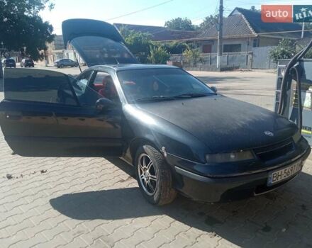 Чорний Опель Калібра, об'ємом двигуна 2 л та пробігом 256 тис. км за 3000 $, фото 1 на Automoto.ua