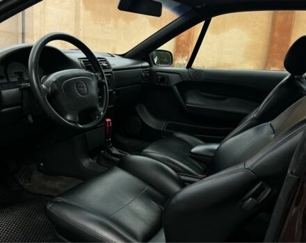 Фиолетовый Опель Калибра, объемом двигателя 2 л и пробегом 280 тыс. км за 2600 $, фото 10 на Automoto.ua