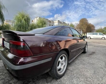 Фиолетовый Опель Калибра, объемом двигателя 2 л и пробегом 280 тыс. км за 2600 $, фото 7 на Automoto.ua