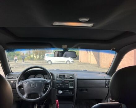 Фиолетовый Опель Калибра, объемом двигателя 2 л и пробегом 280 тыс. км за 2600 $, фото 18 на Automoto.ua