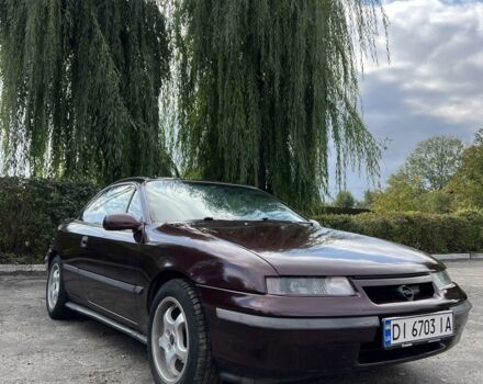 Фиолетовый Опель Калибра, объемом двигателя 2 л и пробегом 280 тыс. км за 2600 $, фото 1 на Automoto.ua