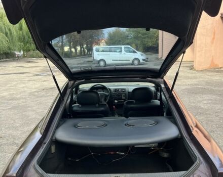 Фиолетовый Опель Калибра, объемом двигателя 2 л и пробегом 280 тыс. км за 2600 $, фото 5 на Automoto.ua